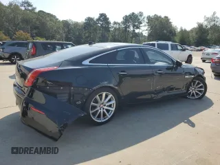 2015 Jaguar XJ with VIN SAJWA1CZ7F8V83167, listed as a Copart auction lot 74991144 with 94,502 mi miles and Salvage Title. Bid and sale history available at carsss.com. Image 3.