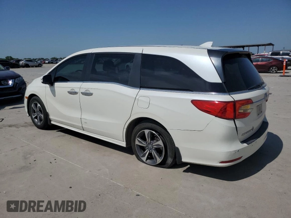 2019 Honda Odyssey Touring with VIN 5FNRL6H86KB089055, listed as a Copart auction lot 56980975 with 154,842 mi miles and Salvage title. Bid and sale history available at DreamBid. Image 2.