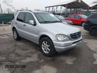 1999 Mercedes-Benz M 320/430/500 with VIN 4JGAB72E4XA113675, listed as a IAAI auction lot 41554604 with 230,092 mi miles and . Bid and sale history available at DreamBid. Image 1.