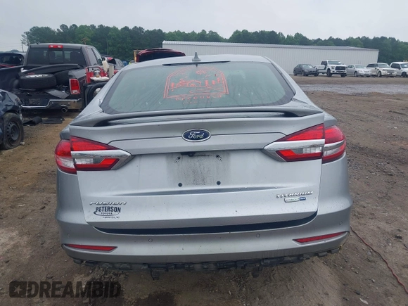 2020 Ford Fusion Titanium with VIN 3FA6P0D99LR138127, listed as a IAAI auction lot 42439024 with 128,792 mi miles and . Bid and sale history available at DreamBid. Image 17.