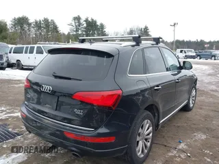 2016 Audi Q5 Premium Plus with VIN WA1L2AFP5GA130873, listed as a IAAI auction lot 41479011 with 84,828 mi miles. Bid and sale history available at carsss.com. Image 4.