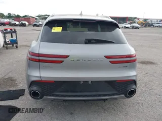 2023 Genesis GV70 Sport with VIN KMUMCDTC1PU098851, listed as a IAAI auction lot 41864774 with 15,016 mi miles and . Bid and sale history available at DreamBid. Image 16.