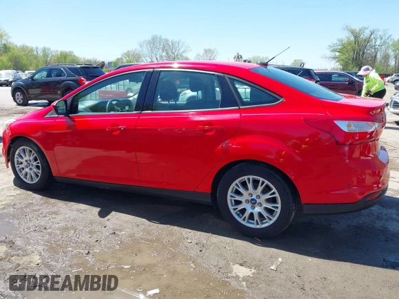 2012 Ford Focus SE z VIN 1FAHP3F23CL333598, wystawiony jako IAAI lot #41970172 z przebiegiem 209 969 mil mil oraz . Historia ofert i sprzedaży dostępna na DreamBid. Obrazek 15.