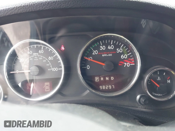 2013 Jeep Wrangler Rubicon 10th Anniversary with VIN 1C4BJWCG2DL651815, listed as a IAAI auction lot 41643919 with 98,297 mi miles and . Bid and sale history available at DreamBid. Image 7.