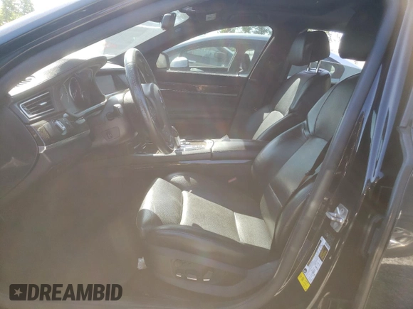 2012 BMW 7 Series 750i with VIN WBAKA8C59CDX01027, listed as a Copart auction lot 57881955 with 171,992 mi miles and Clean title. Bid and sale history available at DreamBid. Image 7.