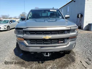 2017 Chevrolet Silverado 1500 LT with VIN 3GCUKREC0HG335785, listed as a Copart auction lot 51456305 with 104,614 mi miles and Salvage Title. Bid and sale history available at DreamBid. Image 5.
