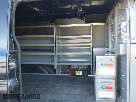 2016 Ford Transit Cargo with VIN 1FTYE1YM5GKB54302, listed as a IAAI auction lot 40715142 with 119,047 mi miles. Bid and sale history available at carsss.com. Image 7.