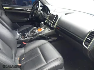 2012 Porsche Cayenne S Hybrid with VIN WP1AE2A2XCLA90082, listed as a IAAI auction lot 41960714 with 139,081 mi miles. Bid and sale history available at carsss.com. Image 5.