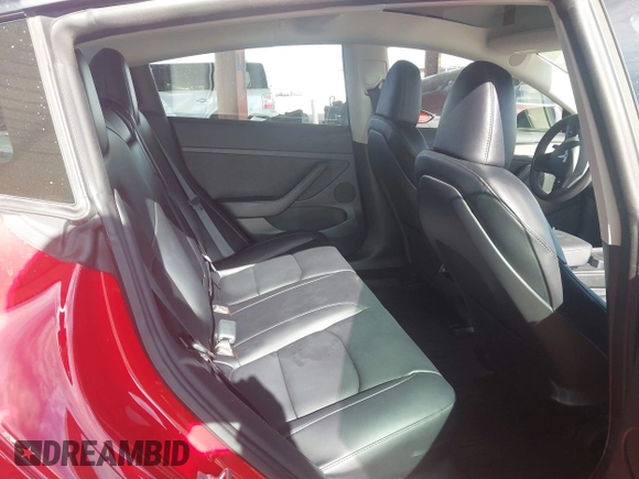 2023 Tesla Model 3 with VIN 5YJ3E1EA9PF546264, listed as a IAAI auction lot 41657055 with 5,634 mi miles and . Bid and sale history available at DreamBid. Image 8.