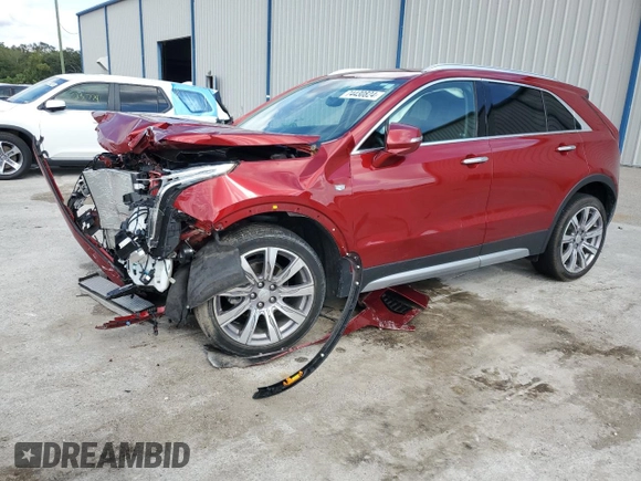 2021 Cadillac XT4 FWD Premium Luxury with VIN 1GYFZCR41MF043072, listed as a Copart auction lot 74430824 with 31,053 mi miles and Salvage Title. Bid and sale history available at carsss.com. Image 1.