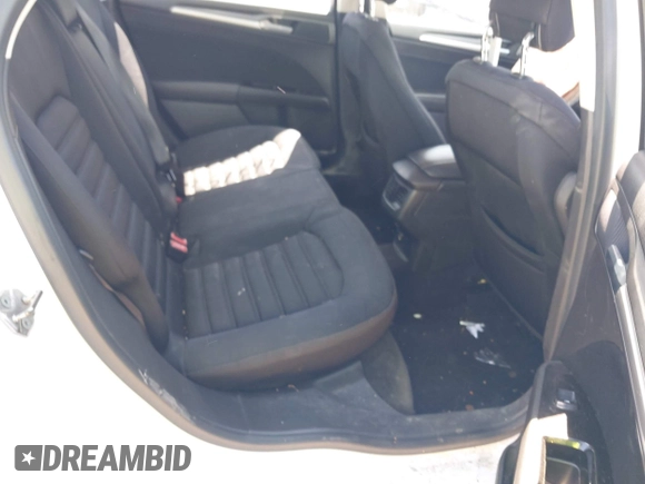 2013 Ford Fusion SE Hybrid z VIN 3FA6P0LU9DR349321, wystawiony jako IAAI lot #42156321 z przebiegiem 90 688 mil mil oraz . Historia ofert i sprzedaży dostępna na DreamBid. Obrazek 8.