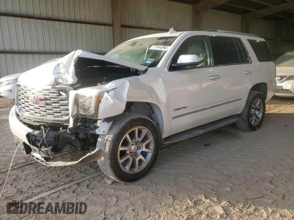 2019 GMC Yukon Denali with VIN 1GKS1CKJ7KR370524, listed as a Copart auction lot 77344394 with 39,753 mi miles and Salvage Title. Bid and sale history available at carsss.com. Image 1.