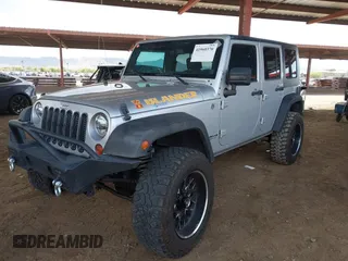 2010 Jeep Wrangler Unlimited Sport with VIN 1J4BA3H18AL161243, listed as a IAAI auction lot 41960370 with 89,004 mi miles. Bid and sale history available at carsss.com. Image 2.