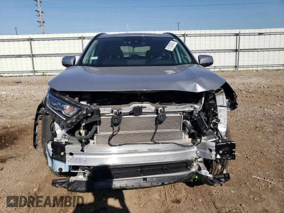 2021 Toyota RAV4 Hybrid LE with VIN 2T3B6RFV7MW019757, listed as a Copart auction lot 61929085 with 14,675 mi miles and Salvage title. Bid and sale history available at DreamBid. Image 5.