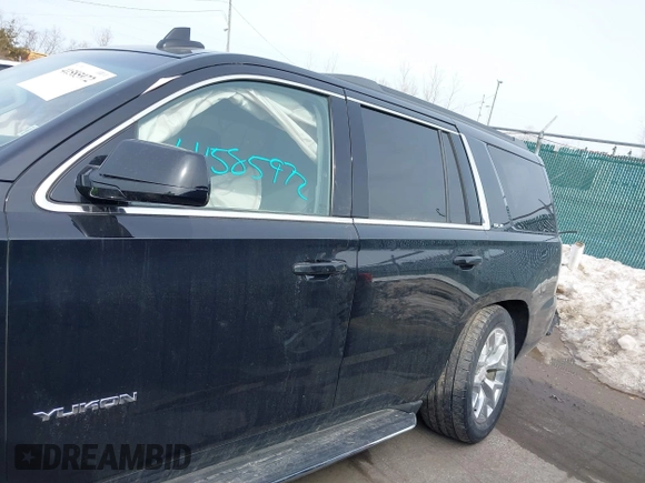 2016 GMC Yukon SLE with VIN 1GKS2AKC3GR398556, listed as a IAAI auction lot 41585972 with 130,961 mi miles. Bid and sale history available at carsss.com. Image 15.