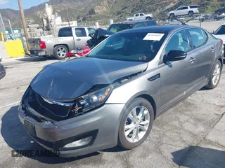 2013 Kia Optima EX z VIN 5XXGN4A70DG252497, wystawiony jako IAAI lot #42145025 z przebiegiem 90 867 mil mil oraz . Historia ofert i sprzedaży dostępna na DreamBid. Obrazek 18.