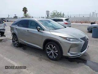 2022 Lexus RX 450h with VIN 2T2HGMDA1NC094391, listed as a IAAI auction lot 42540195 with 33,328 mi miles and . Bid and sale history available at DreamBid. Image 1.