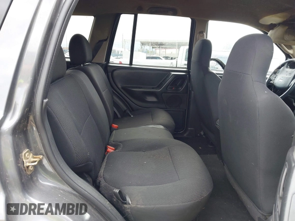 2004 Jeep Grand Cherokee Laredo z VIN 1J4GX48S24C161519, wystawiony jako IAAI lot #42127806 z przebiegiem Nie podano mil oraz . Historia ofert i sprzedaży dostępna na DreamBid. Obrazek 8.