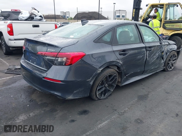 2023 Honda Civic Sport with VIN 2HGFE2F50PH542989, listed as a IAAI auction lot 42184805 with Not provided miles and . Bid and sale history available at DreamBid. Image 4.