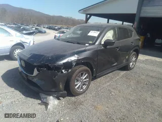 2023 Mazda CX-5 2.5 S Carbon Edition with VIN JM3KFBCM5P0190753, listed as a IAAI auction lot 41730043 with 57,539 mi miles. Bid and sale history available at carsss.com. Image 2.