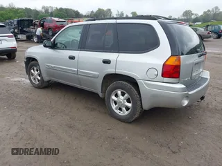 2005 GMC Envoy SLE z VIN 1GKDT13S752159660, wystawiony jako IAAI lot #41996041 z przebiegiem 133 948 mil mil oraz . Historia ofert i sprzedaży dostępna na DreamBid. Obrazek 3.