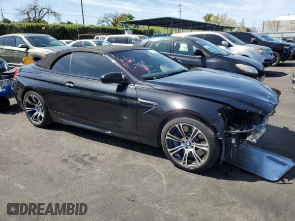 2013 BMW M6 с VIN WBSLZ9C58DDZ78154, выставлен на аукционе Copart как лот 50434845 с пробегом 66 983 миль миль и Списание • Salvage title. История ставок и продаж доступна на DreamBid. Изображение 4.