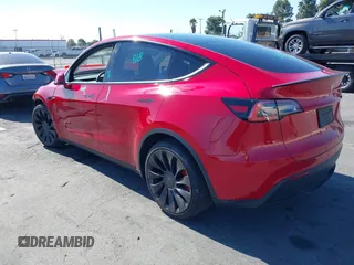 2021 Tesla Model Y Performance with VIN 5YJYGDEF4MF092062, listed as a IAAI auction lot 41583793 with 57,194 mi miles and . Bid and sale history available at DreamBid. Image 3.