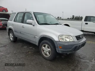 1999 Honda CR-V EX with VIN JHLRD1864XC001402, listed as a Copart auction lot 82047384 with 195,489 mi miles and Clean Title. Bid and sale history available at carsss.com. Image 4.