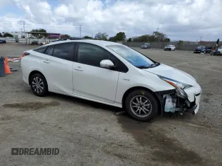2017 Toyota Prius Two with VIN JTDKBRFU1H3055116, listed as a Copart auction lot 51547065 with 118,416 mi miles and Salvage Title. Bid and sale history available at DreamBid. Image 4.
