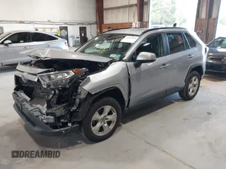 2021 Toyota RAV4 XLE with VIN 2T3P1RFV5MC180890, listed as a IAAI auction lot 42567858 with 56,961 mi miles and . Bid and sale history available at DreamBid. Image 18.