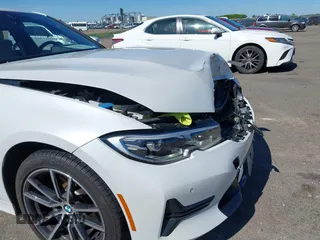 2021 BMW 3 Series 330i xDrive with VIN WBA5R7C0XMFK54525, listed as a IAAI auction lot 42320181 with 54,576 mi miles and . Bid and sale history available at DreamBid. Image 17.