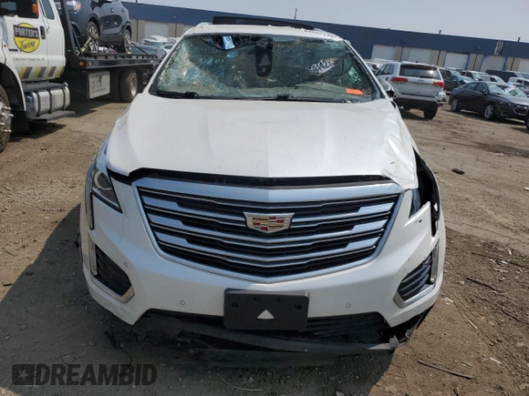 2017 Cadillac XT5 Luxury FWD with VIN 1GYKNBRS2HZ296859, listed as a Copart auction lot 64982445 with 30,765 mi miles and Salvage title. Bid and sale history available at DreamBid. Image 5.