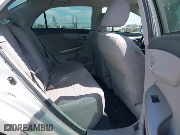 2011 Toyota Corolla L with VIN JTDBU4EE9B9156724, listed as a IAAI auction lot 42138344 with 96,486 mi miles and . Bid and sale history available at DreamBid. Image 8.
