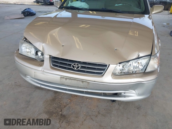 2001 Toyota Camry LE z VIN JT2BF28K110320365, wystawiony jako IAAI lot #41993343 z przebiegiem 211 458 mil mil oraz . Historia ofert i sprzedaży dostępna na DreamBid. Obrazek 6.
