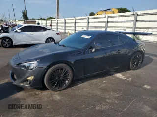 2014 Scion FR-S z VIN JF1ZNAA18E8702670, wystawiony jako Copart lot #58137575 z przebiegiem 136 087 mil mil oraz Czysty tytuł • Clean title. Historia ofert i sprzedaży dostępna na DreamBid. Obrazek 1.