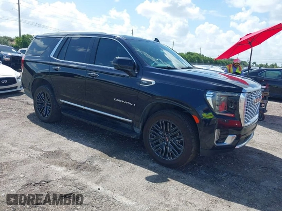 2021 GMC Yukon Denali with VIN 1GKS2DKL7MR471280, listed as a IAAI auction lot 40189766 with 126,591 mi miles. Bid and sale history available at carsss.com. Image 1.