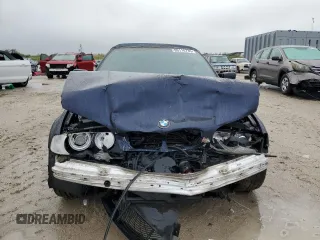 2001 BMW 3 Series 325Ci with VIN WBABS33441JY51892, listed as a Copart auction lot 89110735 with 142,771 mi miles and Salvage Title. Bid and sale history available at carsss.com. Image 5.
