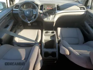 2018 Honda Odyssey LX with VIN 5FNRL6H22JB087152, listed as a Copart auction lot 76754974 with 73,057 mi miles and Salvage Title. Bid and sale history available at carsss.com. Image 8.