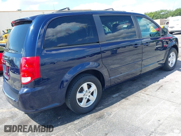 2013 Dodge Grand Caravan SXT with VIN 2C4RDGCG3DR611519, listed as a IAAI auction lot 42237571 with 156,858 mi miles and . Bid and sale history available at DreamBid. Image 4.