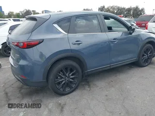 2024 Mazda CX-5 2.5 S Carbon Edition with VIN JM3KFBCL6R0482860, listed as a IAAI auction lot 42108547 with 30,802 mi miles. Bid and sale history available at carsss.com. Image 4.