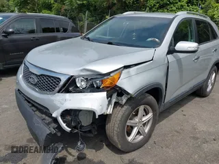 2013 Kia Sorento LX with VIN 5XYKT4A20DG360991, listed as a IAAI auction lot 42258999 with 129,278 mi miles and . Bid and sale history available at DreamBid. Image 6.