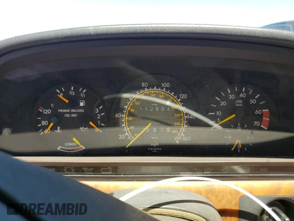 1989 Mercedes-Benz 560 с VIN WDBCA45E0KA478906, выставлен на аукционе Copart как лот 61273615 с пробегом 112 894 миль миль и Чистый • Clean title. История ставок и продаж доступна на DreamBid. Изображение 9.