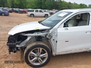2021 Audi Q3 S line Premium with VIN WA1DECF37M1037711, listed as a IAAI auction lot 42096937 with 28,973 mi miles and . Bid and sale history available at DreamBid. Image 6.
