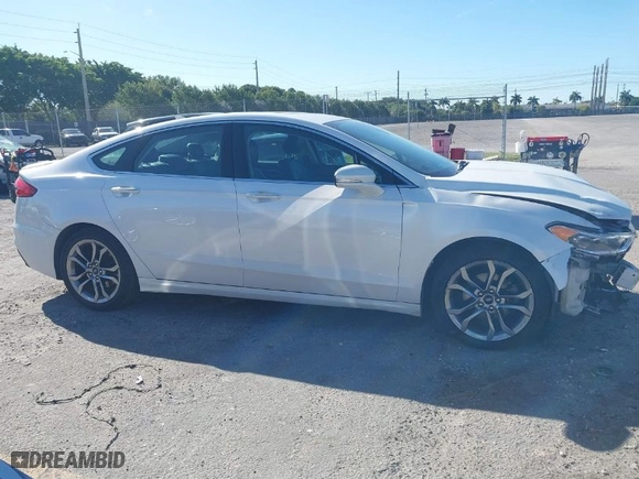 2020 Ford Fusion Hybrid Titanium with VIN 3FA6P0RU4LR182226, listed as a IAAI auction lot 41748021 with 69,234 mi miles. Bid and sale history available at carsss.com. Image 13.