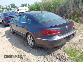 2013 Volkswagen CC Sport Plus z VIN WVWBP7ANXDE553061, wystawiony jako IAAI lot #42468114 z przebiegiem 106 812 mil mil oraz . Historia ofert i sprzedaży dostępna na DreamBid. Obrazek 3.