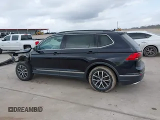 2020 Volkswagen Tiguan SE with VIN 3VV3B7AX7LM067046, listed as a IAAI auction lot 41697405 with 53,573 mi miles and . Bid and sale history available at DreamBid. Image 14.