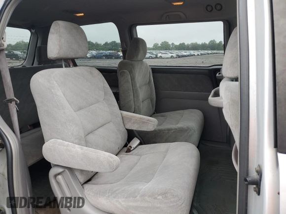 2003 Honda Odyssey EX z VIN 5FNRL18603B008148, wystawiony jako Copart lot #60669825 z przebiegiem 128 115 mil mil oraz Czysty tytuł • Clean title. Historia ofert i sprzedaży dostępna na DreamBid. Obrazek 11.