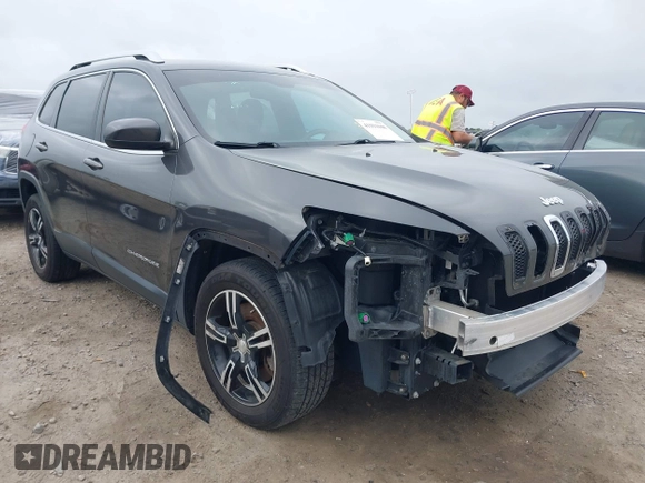 2015 Jeep Cherokee Latitude with VIN 1C4PJLCB0FW601862, listed as a IAAI auction lot 41931048 with 100,705 mi miles and . Bid and sale history available at DreamBid. Image 1.