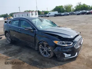 2019 Ford Fusion Titanium with VIN 3FA6P0D92KR247270, listed as a IAAI auction lot 42474803 with Not provided miles and . Bid and sale history available at DreamBid. Image 1.