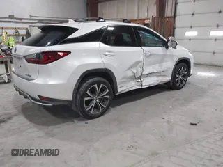 2020 Lexus RX with VIN 2T2HGMDA9LC043542, listed as a IAAI auction lot 41498131 with 63,689 mi miles. Bid and sale history available at carsss.com. Image 4.
